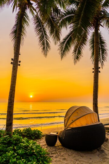 umbrella-chair-beautiful-beach-sea-sunrise-time-travel-vacation_74190-7912.jpg