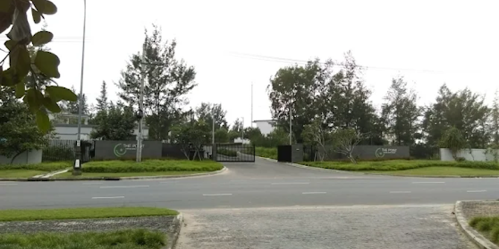 Gated Community Entrance with Lush Landscaping Gated Community Entrance with Lush Landscaping